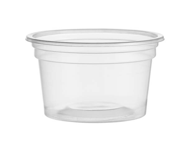 Plastic cup disposable ketchup bowl Plastic cup disposable ketchup bowl (with clipping path) isolated on white background condiment stock pictures, royalty-free photos & images