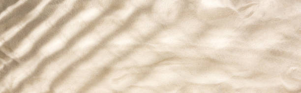 istock panoramic shot of sand with shadows and copy space 1152029908