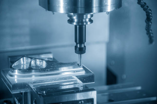 istock The  CNC milling machine cutting the mould part with the solid ball end mill tool. 1152030573