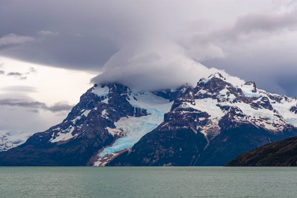 Wide angle photograph of the Balmaceda Mountain and Balmaceda Glacier inside Bernardo O'higgins national park by the Last Hope Sound or fjord, Puerto Natales, Patagonia, Chile.
