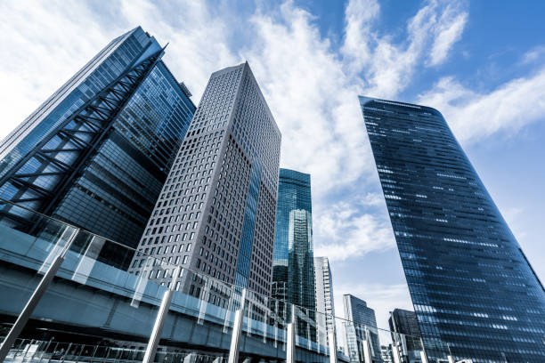 high-rise buildings and blue sky - shiodome urban scene blurred motion tokyo prefecture imagens e fotografias de stock