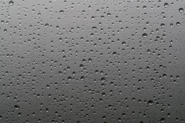 istock Rain drops on window glasses natural pattern of raindrops background 1152035279