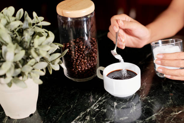 istock Woman making coffee in the morning 1152035656