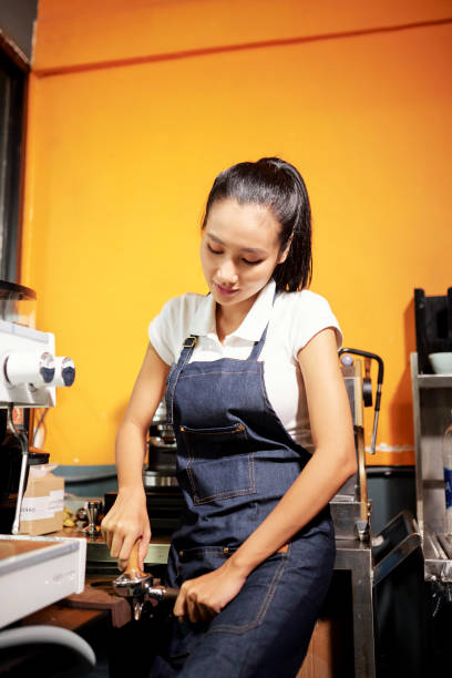 istock Barista preparing coffee drink 1152036122