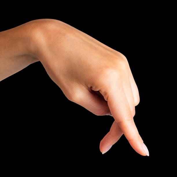 istock Female hand showing walking or dancing fingers 1152036904