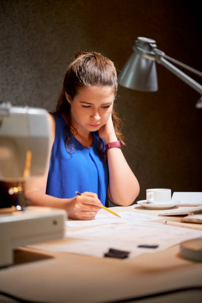 istock Woman drawing at the workplace at office 1152041290