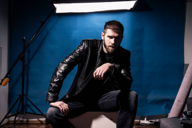 istock One man, musician posing, rock-star style portrait. 1152042103