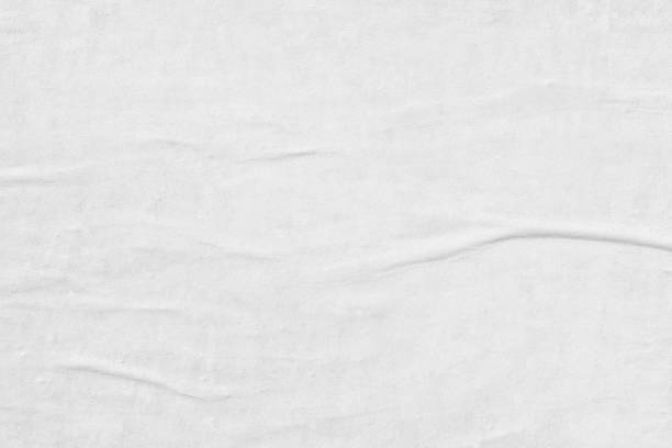 istock Blank old ripped torn paper crumpled creased posters grunge textures backdrop backgrounds 1152042254