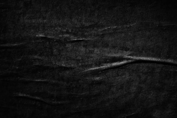 istock Dark black blank paper backgrounds creased crumpled surface old torn ripped posters grunge textures placard 1152042332
