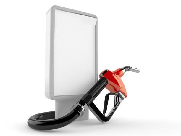 Gasoline nozzle with blank billboard stock photo