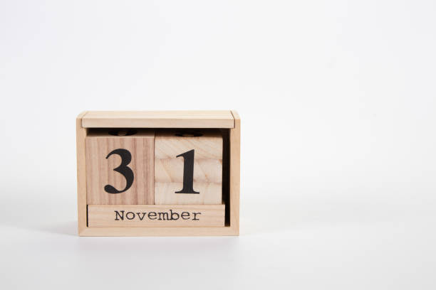 istock Wooden calendar November 31 on a white background 1152047982