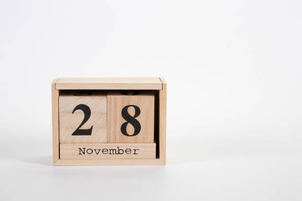 istock Wooden calendar November 28 on a white background 1152048158