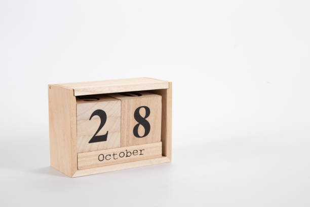 istock Wooden calendar October 28 on a white background 1152048950