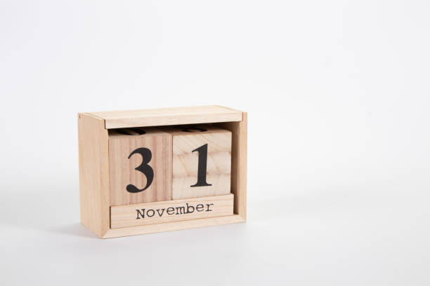 istock Wooden calendar November 31 on a white background 1152048963