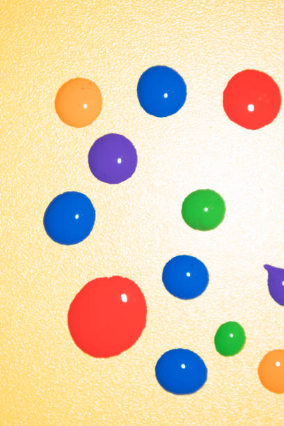 istock Confetti. Colorful dots view from above on a light background. Top view.Hand painted circles of multiple colors 1152049934