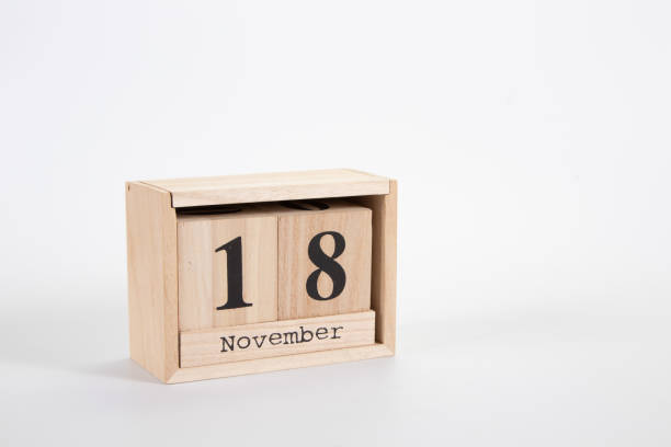 istock Wooden calendar November 18 on a white background 1152050045