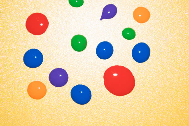 istock Confetti. Colorful dots view from above on a light background. Top view.Hand painted circles of multiple colors 1152051933