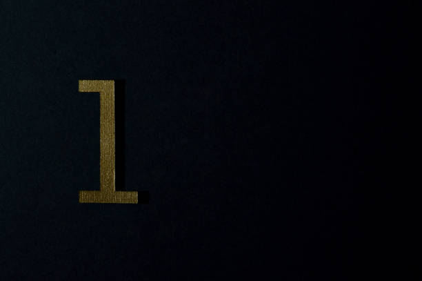 istock gold number one on dark background 1152052202