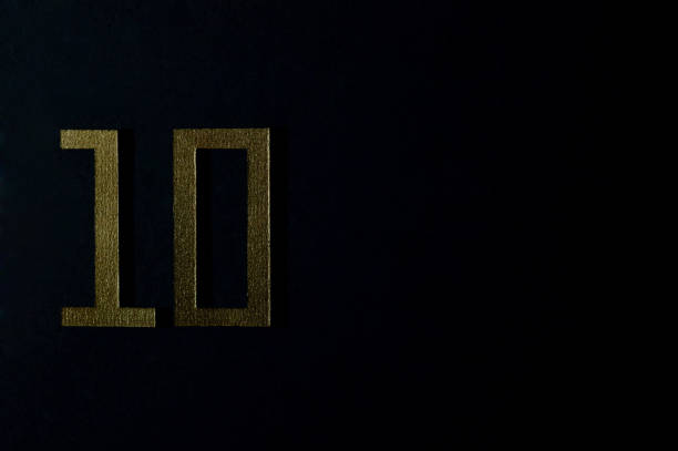 istock gold number ten on dark background 1152052281
