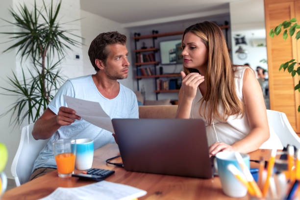 istock Couple paying bills online 1152053305