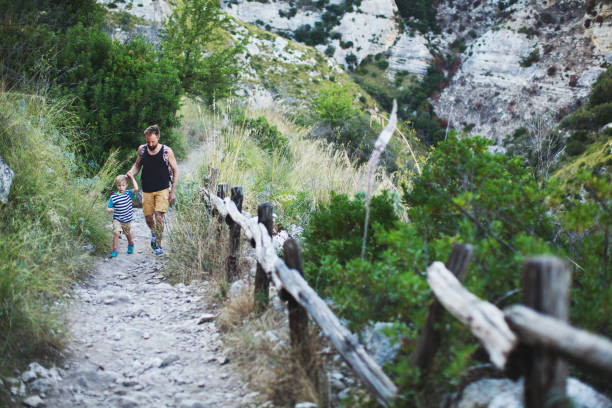 istock Family hiking in mountains 1152058969