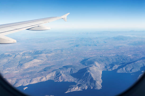 istock view of the mountains from an airplane window 1152062851