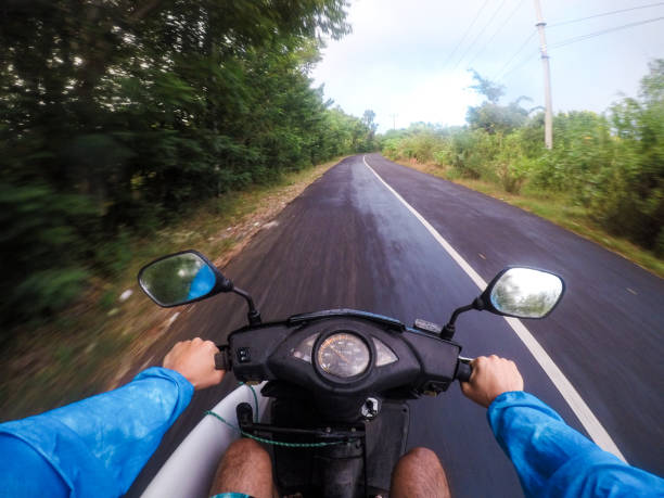 istock Man riding a motorbike in Bali 1152065162