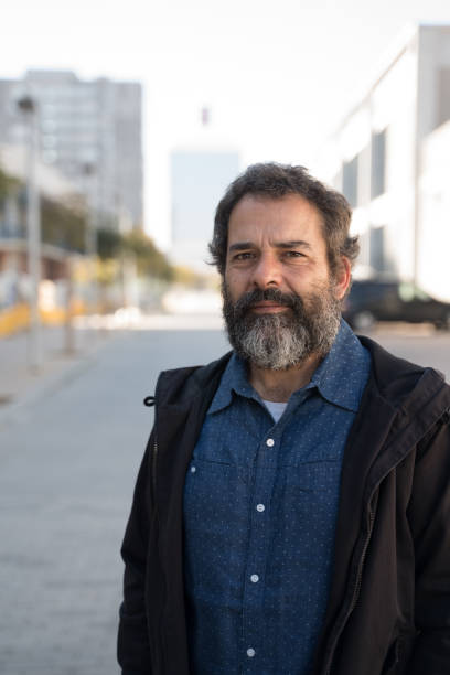 istock Middle aged man in a city street 1152067575