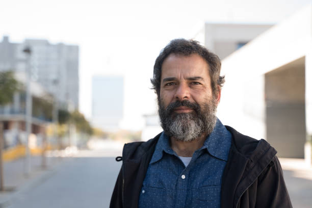 istock Middle aged man in a city street 1152067580
