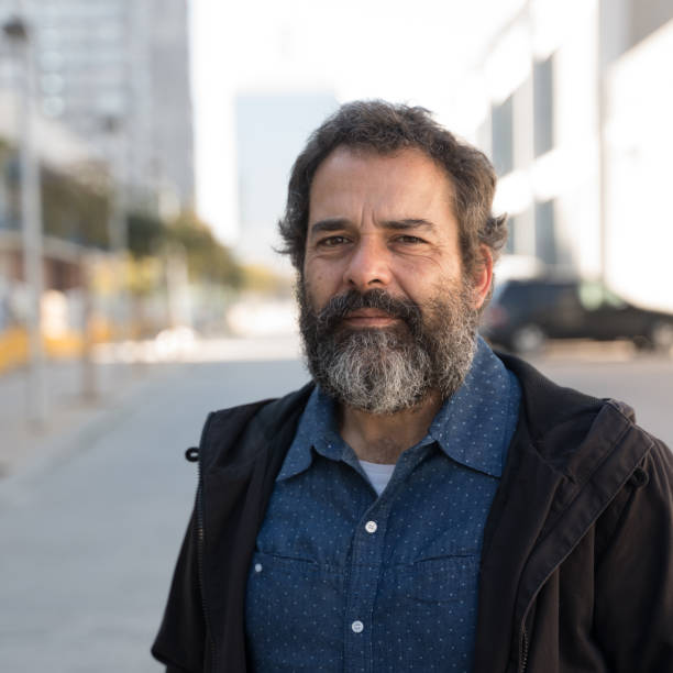 istock Middle aged man in a city street 1152067583