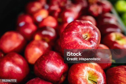 istock Delicious red apples on retail display at supermarket 1152067772