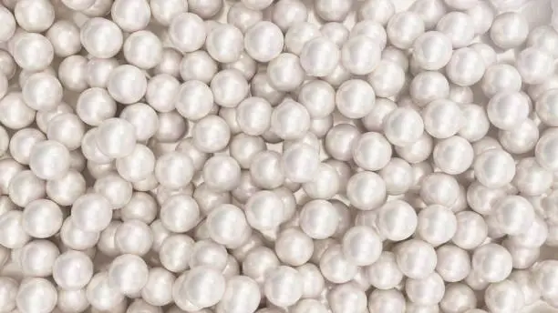 Photo of Pile of pearls. Background of the plurality of beautiful pearls. Gems, women's jewelry, nacre beads. Background For your banner, poster, logo. Beautiful shiny sea pearl. 3d rendering