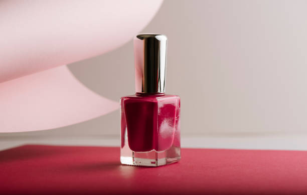 istock Pink nail polish on pastel color background 1152070338