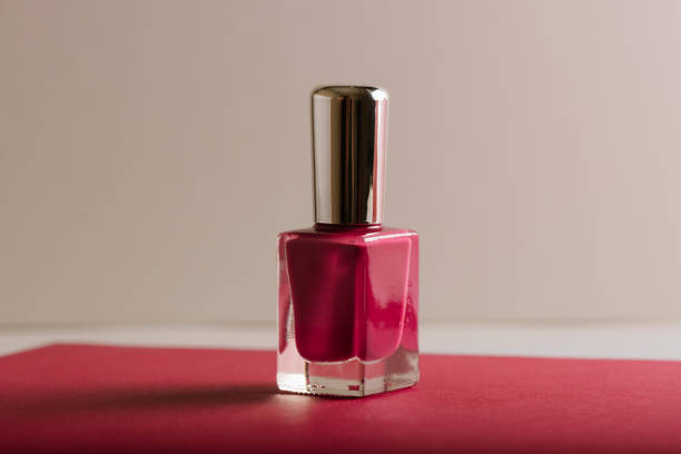 istock Pink nail polish on pastel color background 1152070861