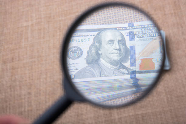 istock Close up of Benjamin Franklin face on US dollar 1152074177