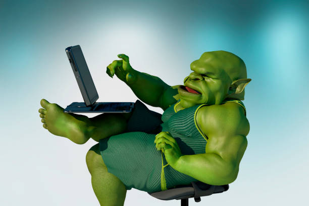Troll Rage Computer 70+ Evil Troll Using A Computer Stock Photos, Pictures & Royalty-Free ...