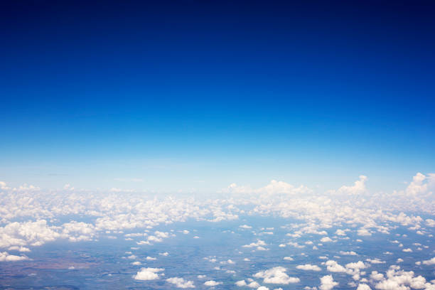 istock Blue sky background and white clouds soft focus, top view take a picture on airplane. 1152074536