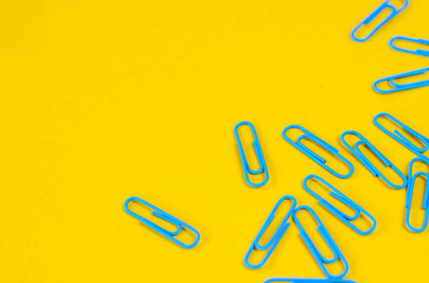 istock Orange background with shallow blue stationery. 1152075587