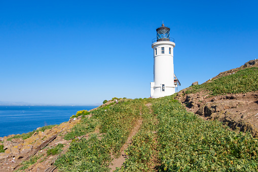 Stock photograph of the lighthouse on Anacapa Island in Channel Islands National Park, California, USA on a sunny day