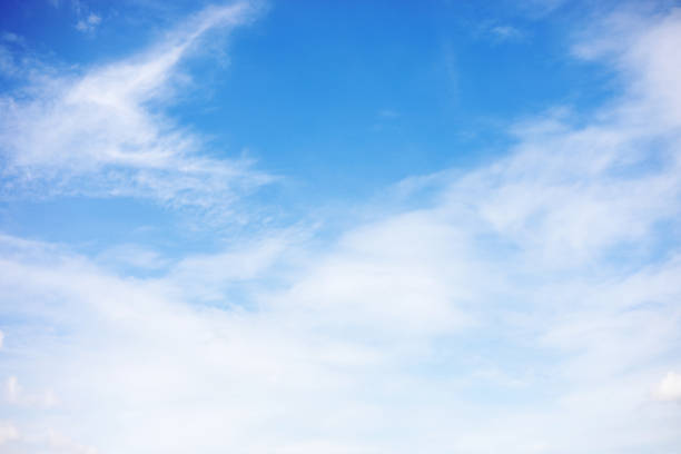 istock Blue sky background and white clouds soft focus, and copy space 1152077989