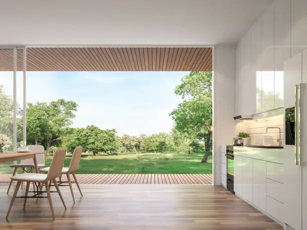 Photo of Modern kitchen and dining room with nature view 3d render