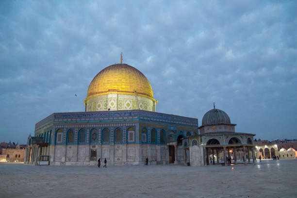 Dome of the Rock at the dusk Dome of the Rock (Kubbet'üs-Sahra) Islamic Mosque Temple Mount at dusk. Muslims are coming out of the morning prayer. al aksa mosque stock pictures, royalty-free photos & images