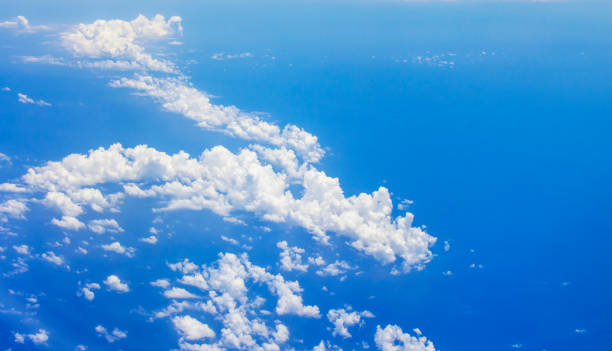 istock Blue sky background and white clouds soft focus, top view and copy space 1152079138