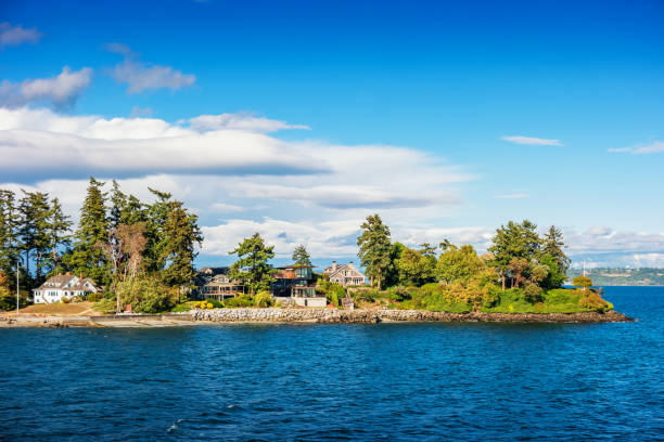 Houses on Bainbridge Island Puget Sound Washington USA Stock photograph of Houses on Bainbridge Island in Puget Sound, Washington, USA bainbridge island stock pictures, royalty-free photos & images