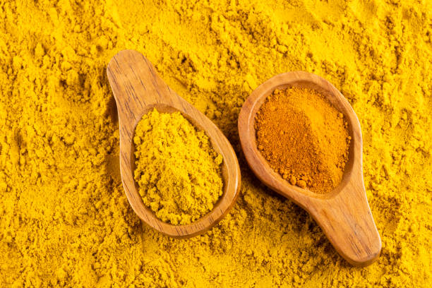 istock Turmeric and curry organic powder - Text space 1152080644
