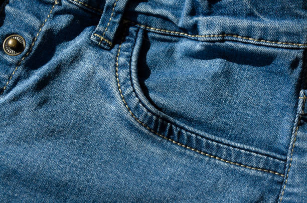 istock Closeup of blue jeans pocket 1152084221