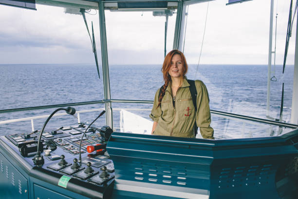 Lady skipper, woman water pilot stock photo