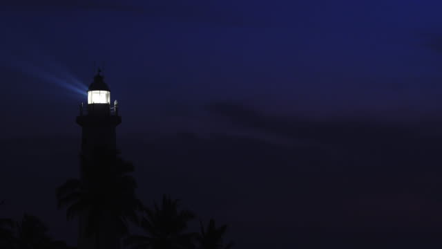 Night seascape with lighthouse