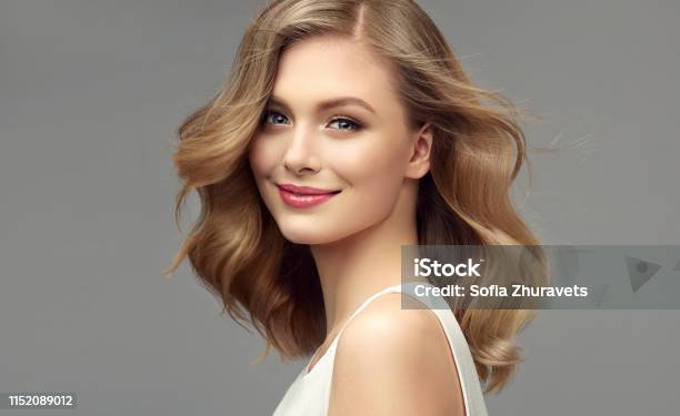 Portrait Of Young Woman With Dark Blonde Hair Cosmetology Hairdressing And Makeup Stock Photo - Download Image Now