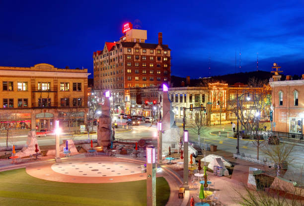 Rapid City, South Dakota Rapid City, South Dakota, USA - May 2, 2019: Evening view of Main Street Square in the Heart of Downtown Rapid City black hills photos stock pictures, royalty-free photos & images